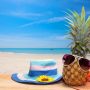 pineapple with sunglasses and hat beach on wood,concept summer background